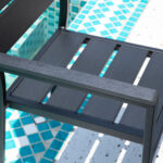 Close-up of plastic wood slats on black modern outdoor chair