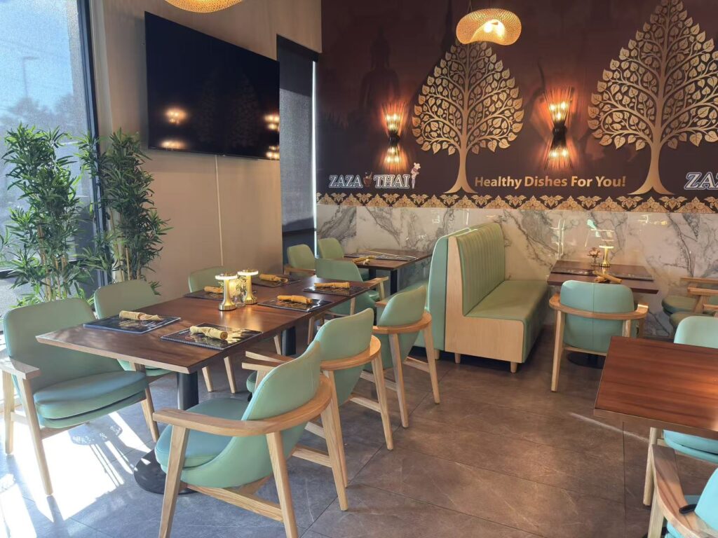Restaurant furniture by FOH Furniture at Zaza Thai featuring modern tables, chairs, and elegant interior design