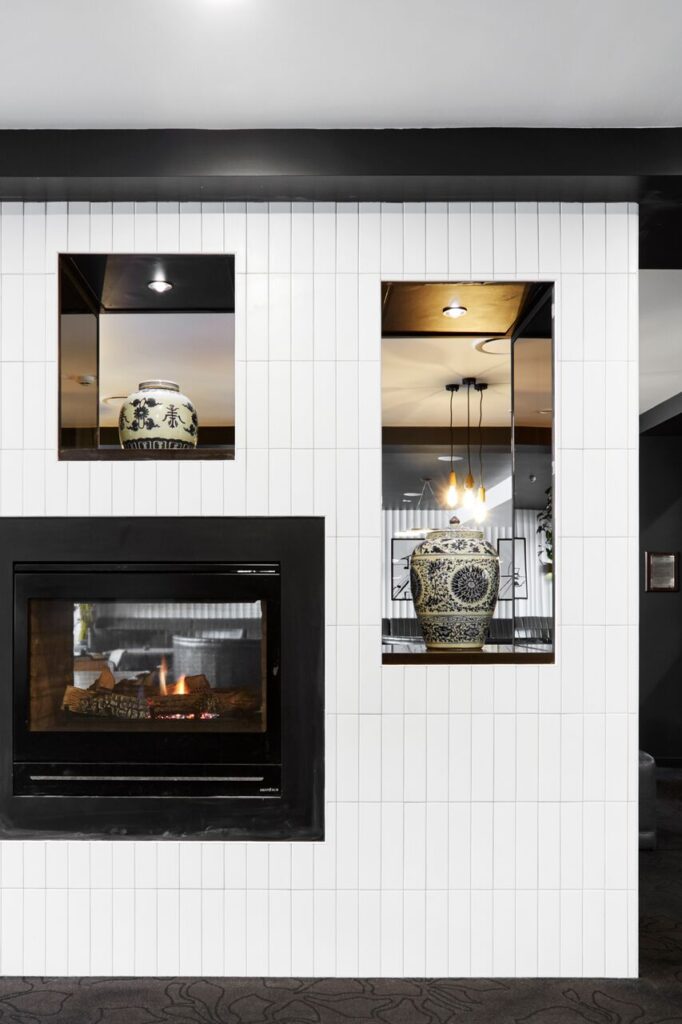 Modern interior wall with white vertical tiles