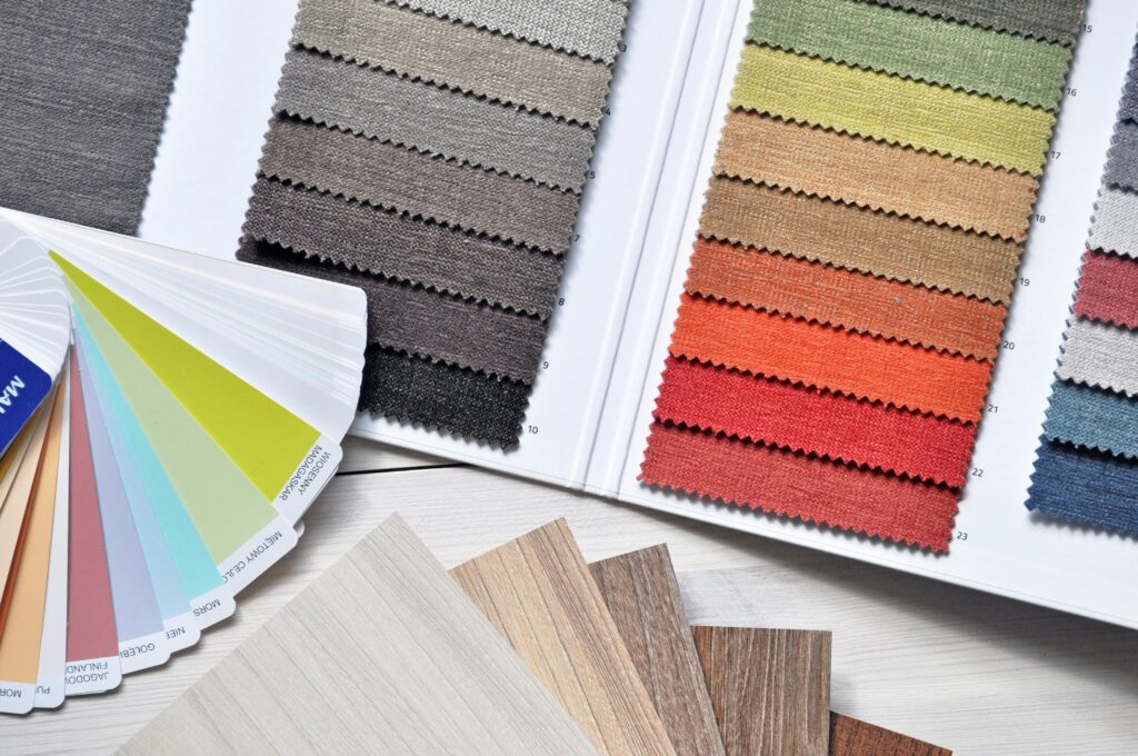 Fabric swatches, color samples, and wood finishes