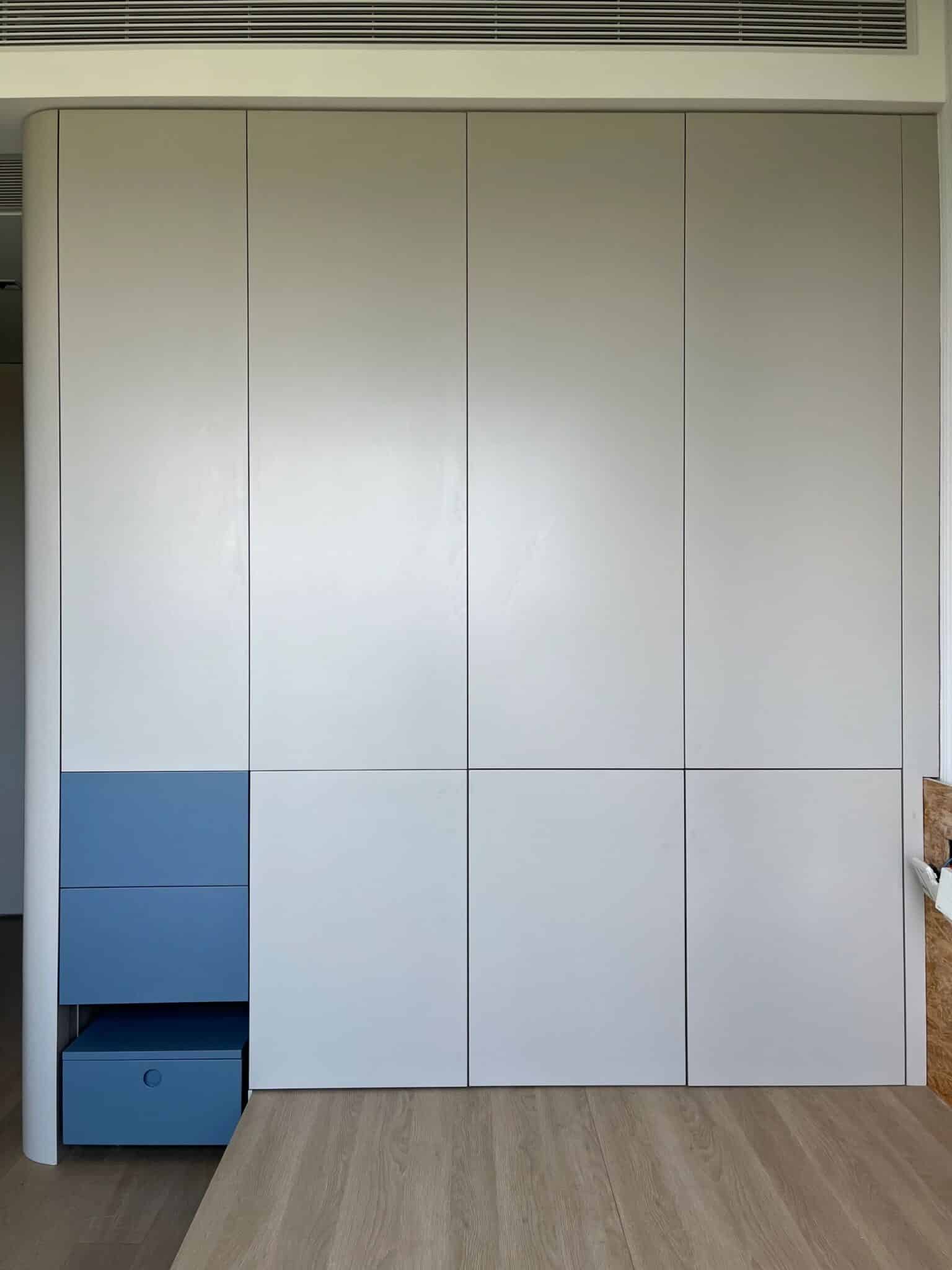 Zenith Bespoke Floor-to-Ceiling Wardrobe – Handleless "Soft-Edge" Corner Suite with Integrated Sky Blue Drawer Module