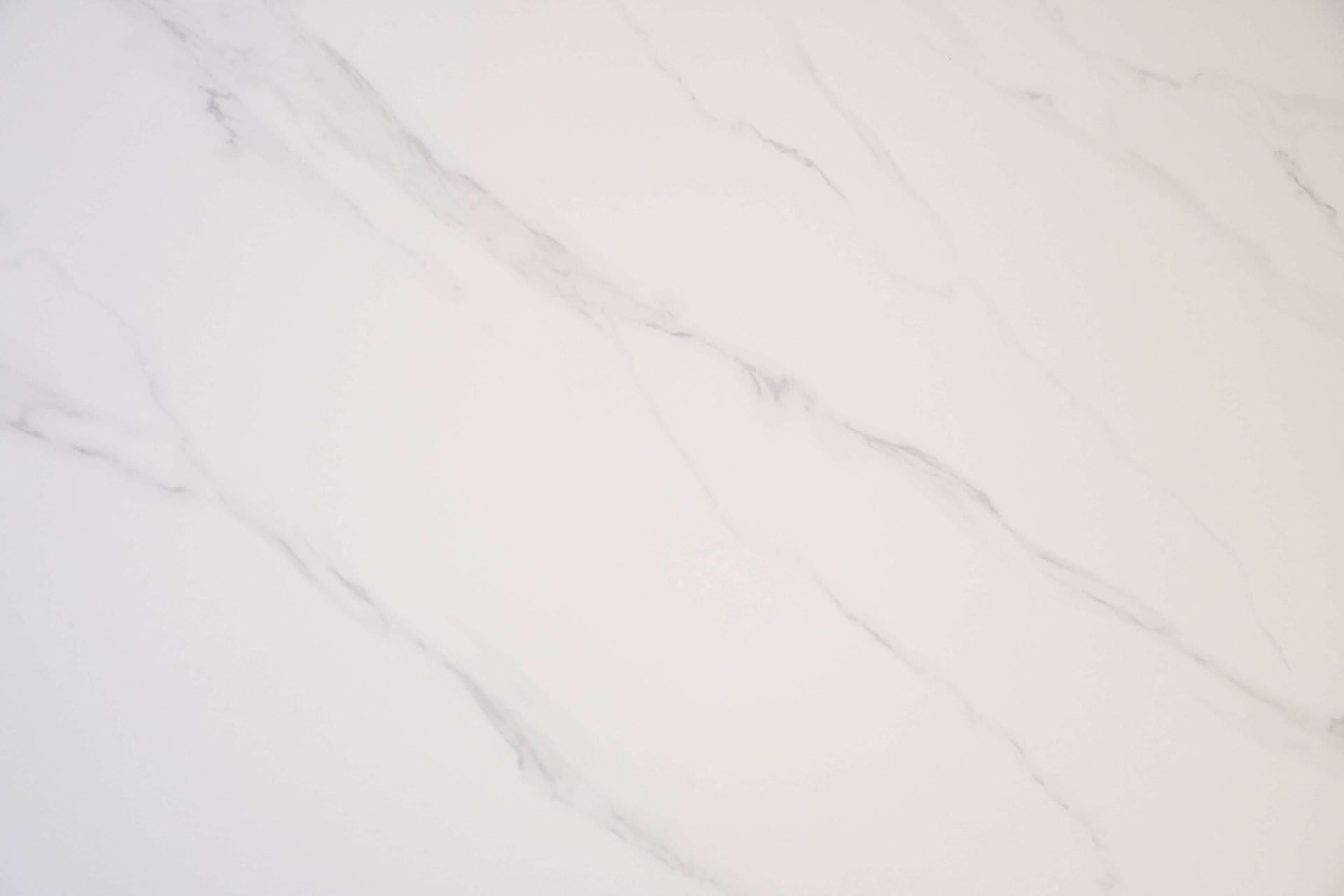 Mesa de restaurante de piedra sinterizada de mármol con base de disco único